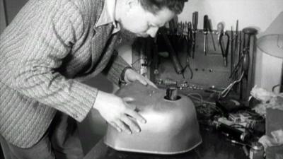 William Grey Walter with his Elsie 'tortoise' robot.