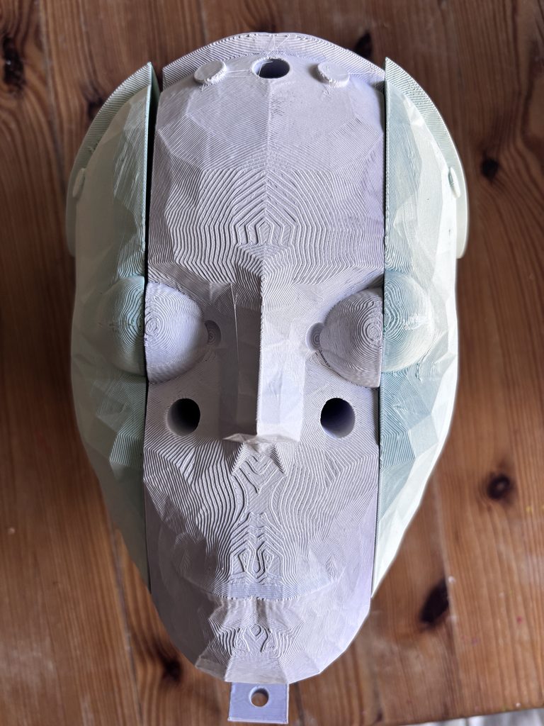 Inner parts of the face mould. There are three parts, a left, a right and a centre mould part. 